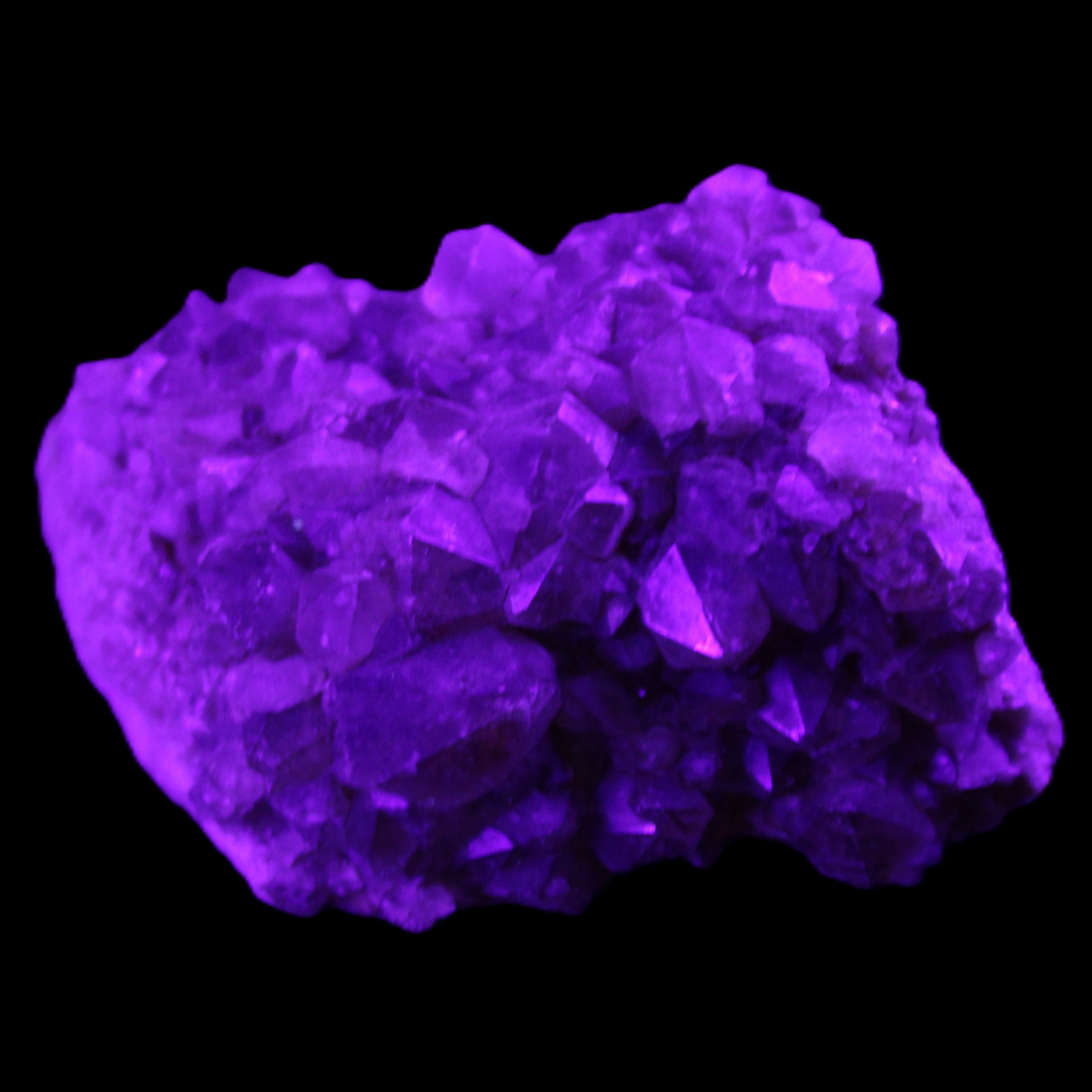Super Seven Amethyst cluster 99g in UV light - Rocks and Things Store