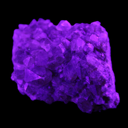Super Seven Amethyst cluster 99g in UV light - Rocks and Things Store