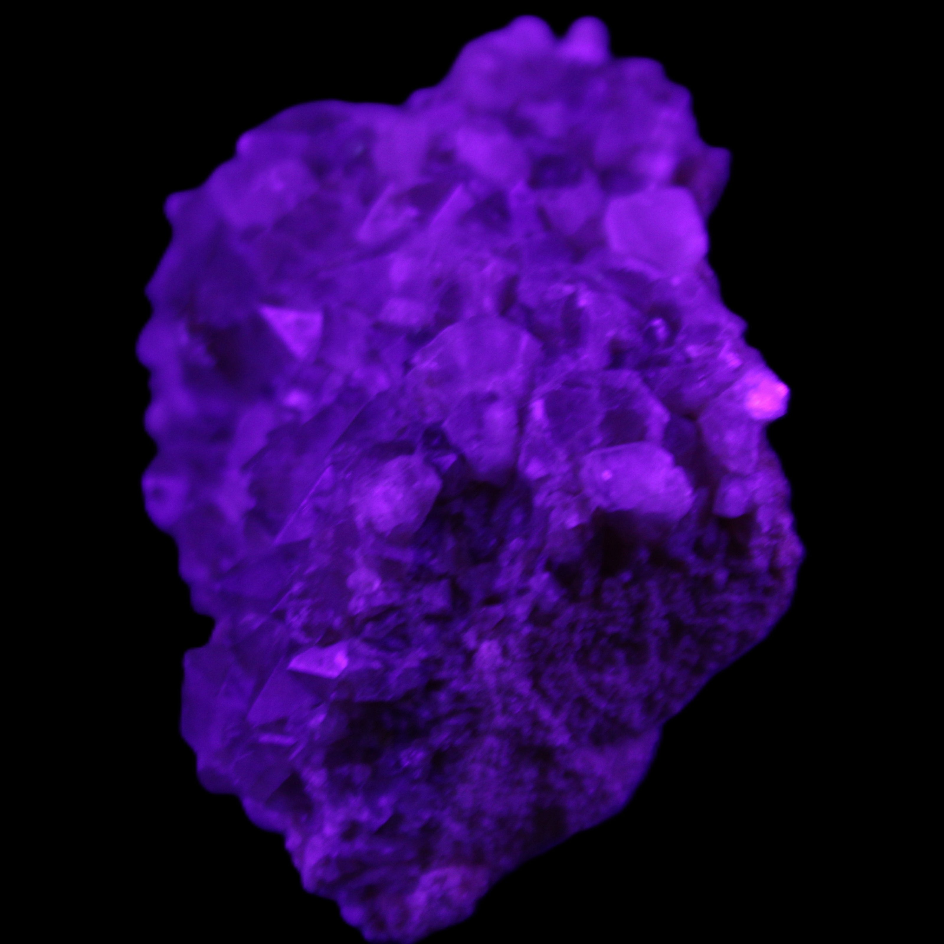 Super Seven Amethyst cluster 99g in UV light - Rocks and Things Store
