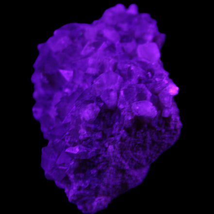 Super Seven Amethyst cluster 99g in UV light - Rocks and Things Store