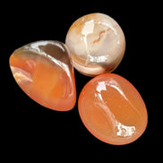 Red Agate 3/4 tumbled tiny stones 7-10g in sunlight - Rocks and Things Store