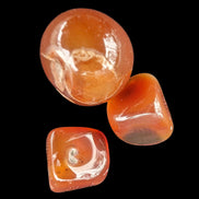 Red Agate 3/4 tumbled tiny stones 7-10g in sunlight - Rocks and Things Store