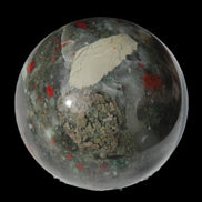 African Bloodstone sphere 84mm 831g in sunlight - Rocks and Things Store