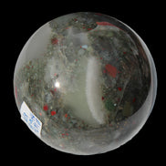 African Bloodstone sphere 84mm 831g in sunlight - Rocks and Things Store