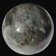 African Bloodstone sphere 84mm 831g in sunlight - Rocks and Things Store