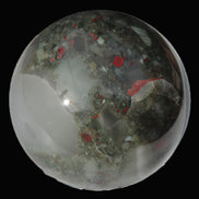 African Bloodstone sphere 84mm 831g in sunlight - Rocks and Things Store