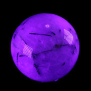 Tourmaline in Quartz sphere 86mm 894g in UV light - Rocks and Things Store