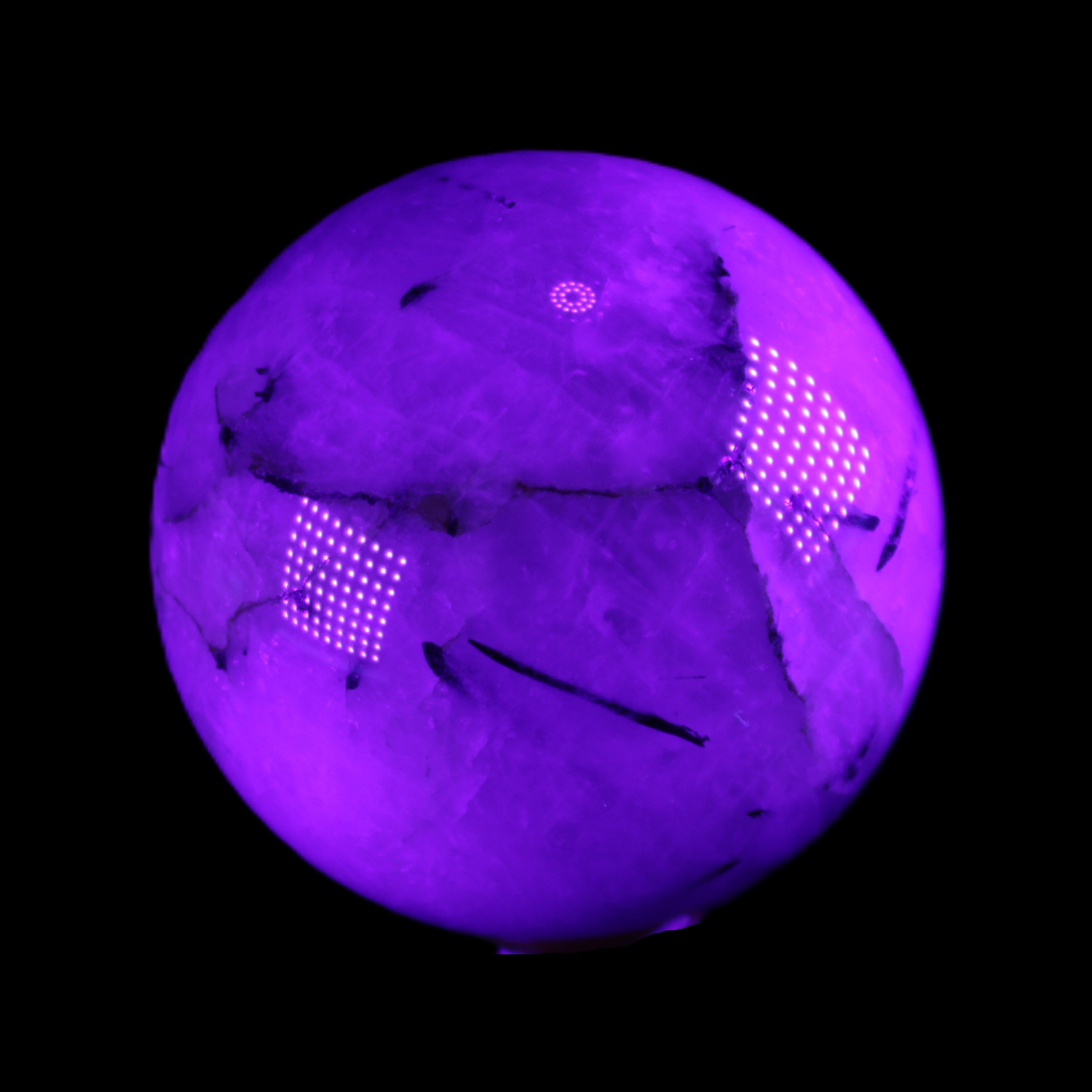 Tourmaline in Quartz sphere 86mm 894g in UV light - Rocks and Things Store