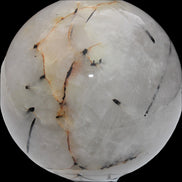 Tourmaline in Quartz sphere 86mm 894g in sunlight - Rocks and Things Store