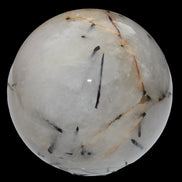 Tourmaline in Quartz sphere 86mm 894g in sunlight - Rocks and Things Store