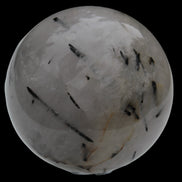 Tourmaline in Quartz sphere 86mm 894g in sunlight - Rocks and Things Store