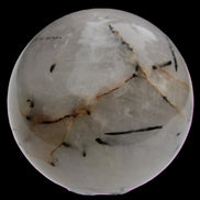 Tourmaline in Quartz sphere 86mm 894g in sunlight - Rocks and Things Store