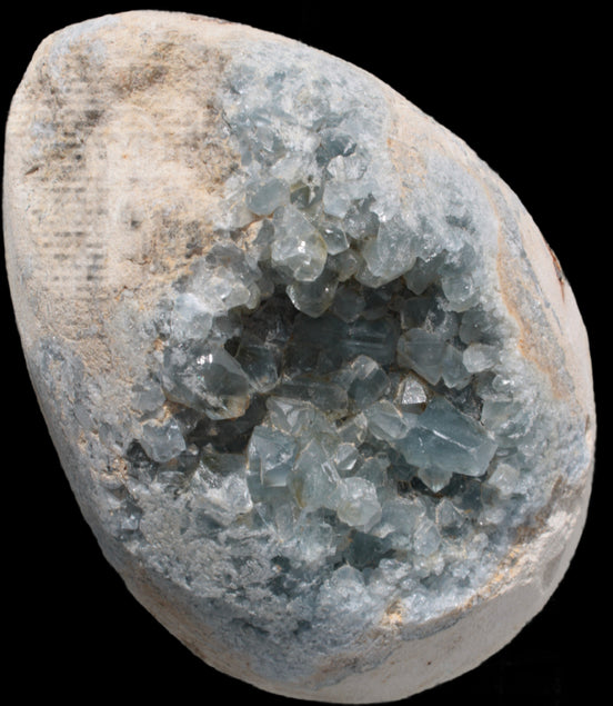 Blue Celestite geode 4990g in sunshine - Rocks and Things Store