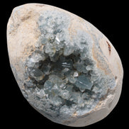Blue Celestite geode 4990g in sunshine - Rocks and Things Store