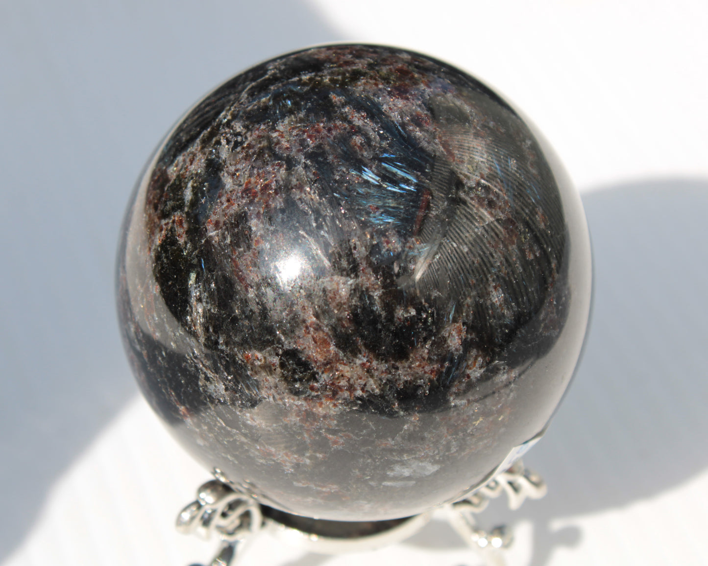 Astrophyllite Garnet sphere 61mm 367g Rocks and Things