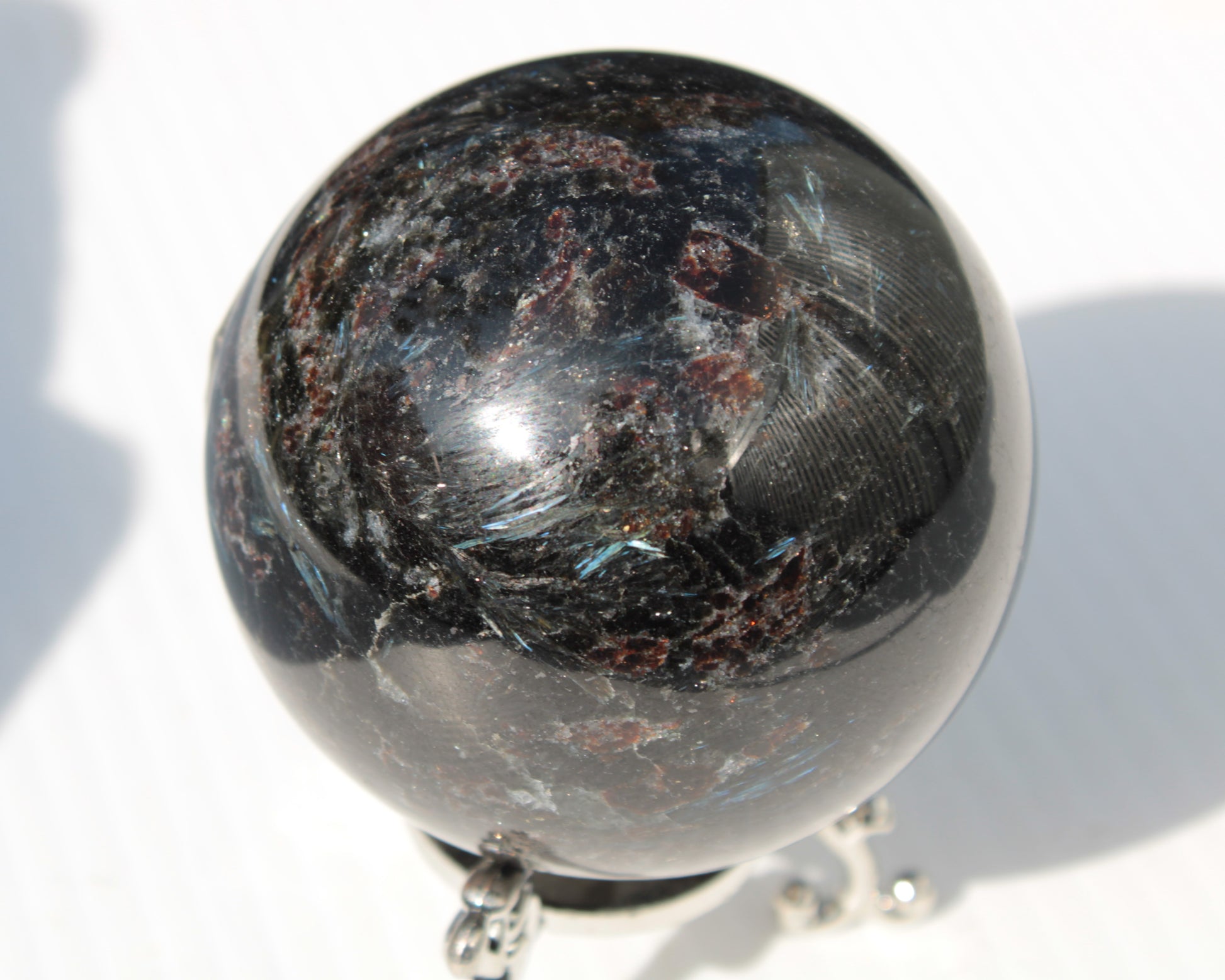 Astrophyllite Garnet sphere 61mm 367g Rocks and Things