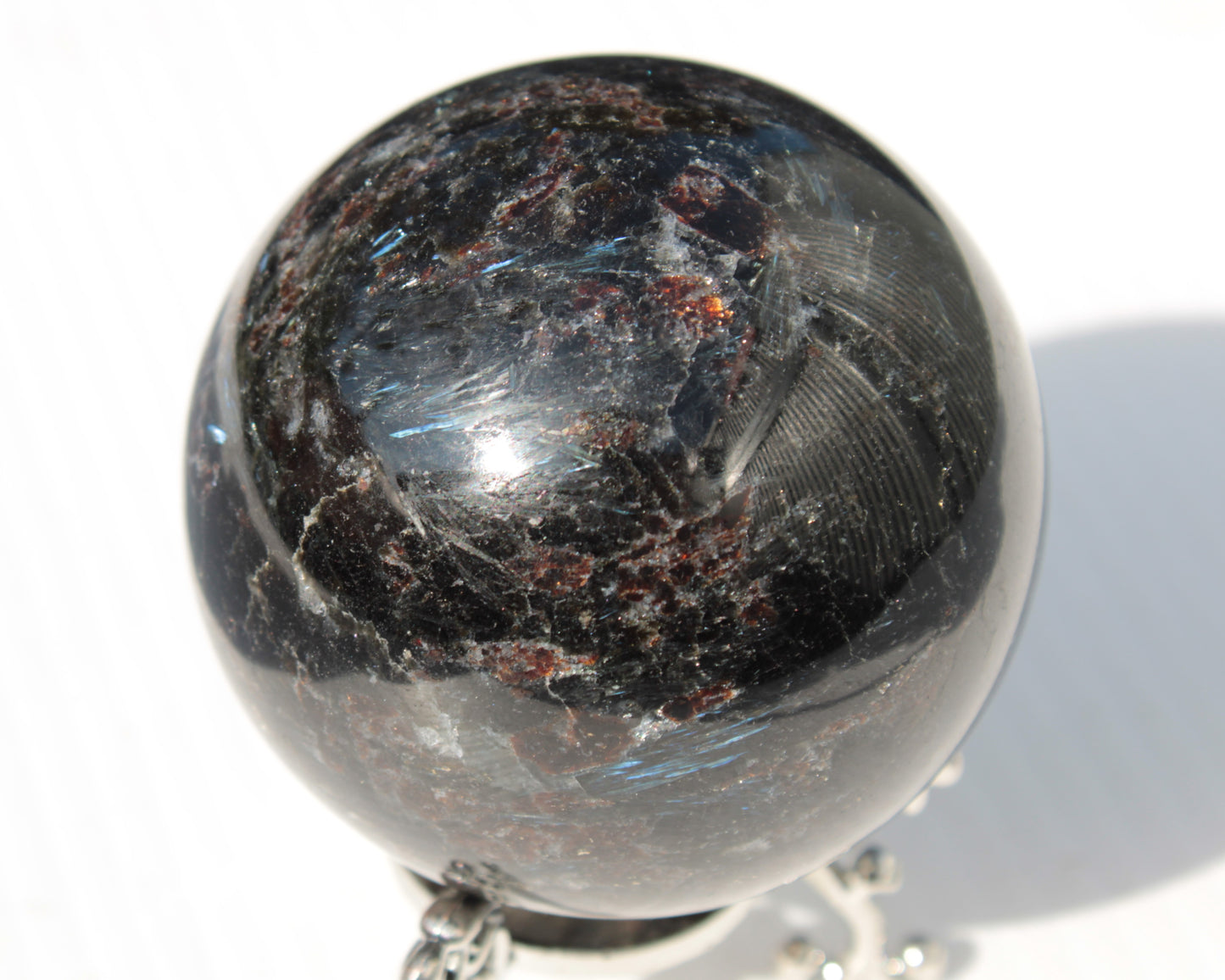 Astrophyllite Garnet sphere 61mm 367g Rocks and Things