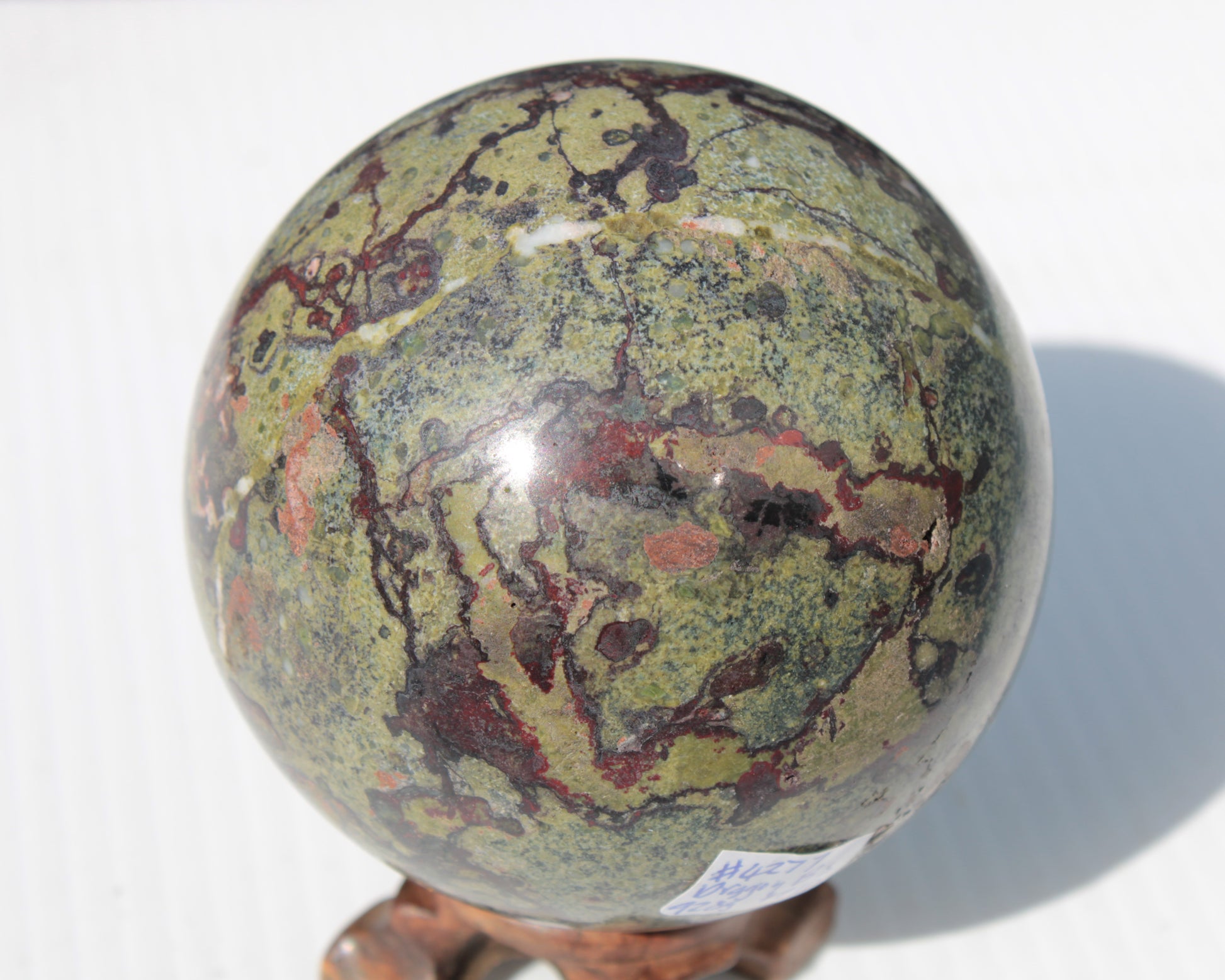 Dragons Blood Stone sphere 83mm 928g Rocks and Things