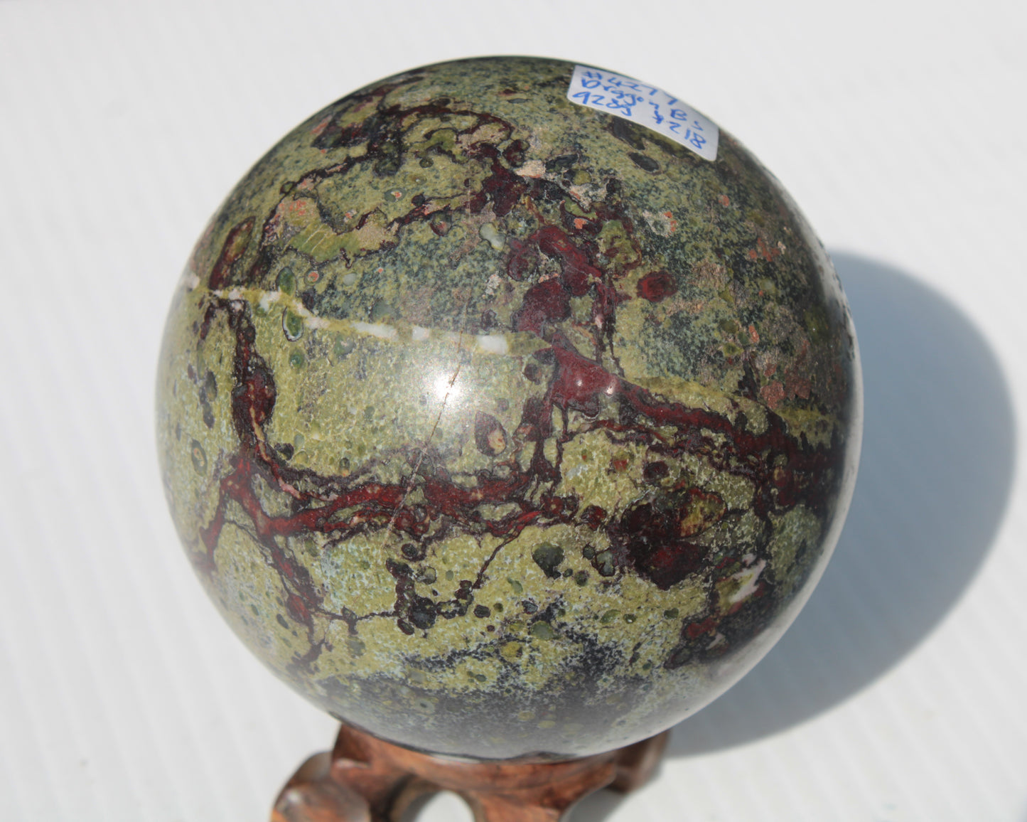 Dragons Blood Stone sphere 83mm 928g Rocks and Things