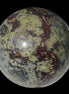 Dragons Blood Stone sphere 83mm 928g in sunlight - Rocks and Things Store