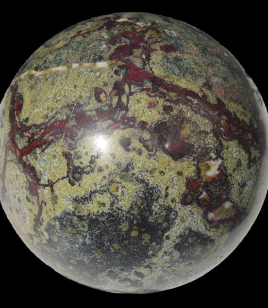 Dragons Blood Stone sphere 83mm 928g in sunlight - Rocks and Things Store