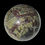 Dragons Blood Stone sphere 83mm 928g in sunlight - Rocks and Things Store