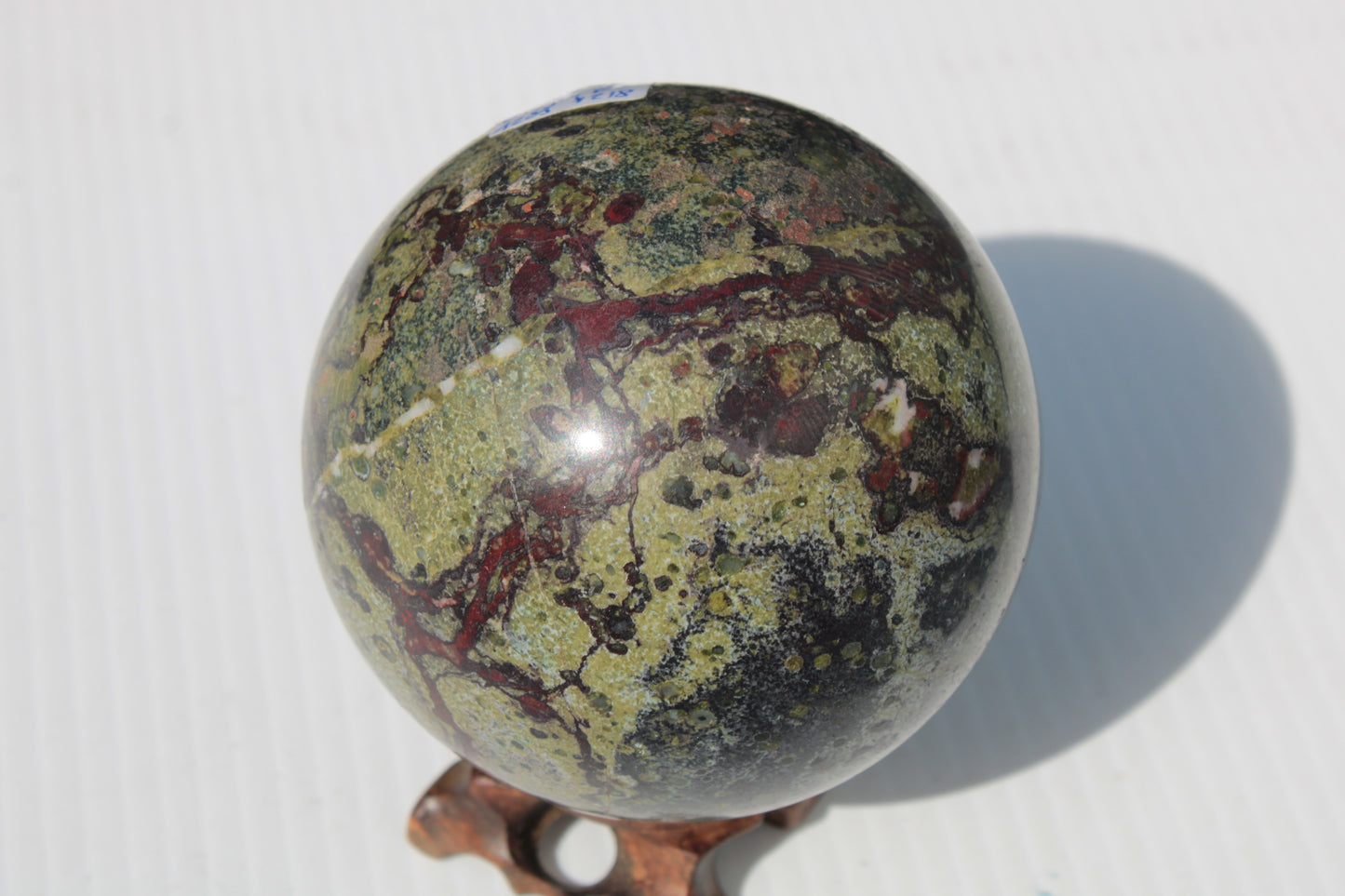 Dragons Blood Stone sphere 83mm 928g Rocks and Things