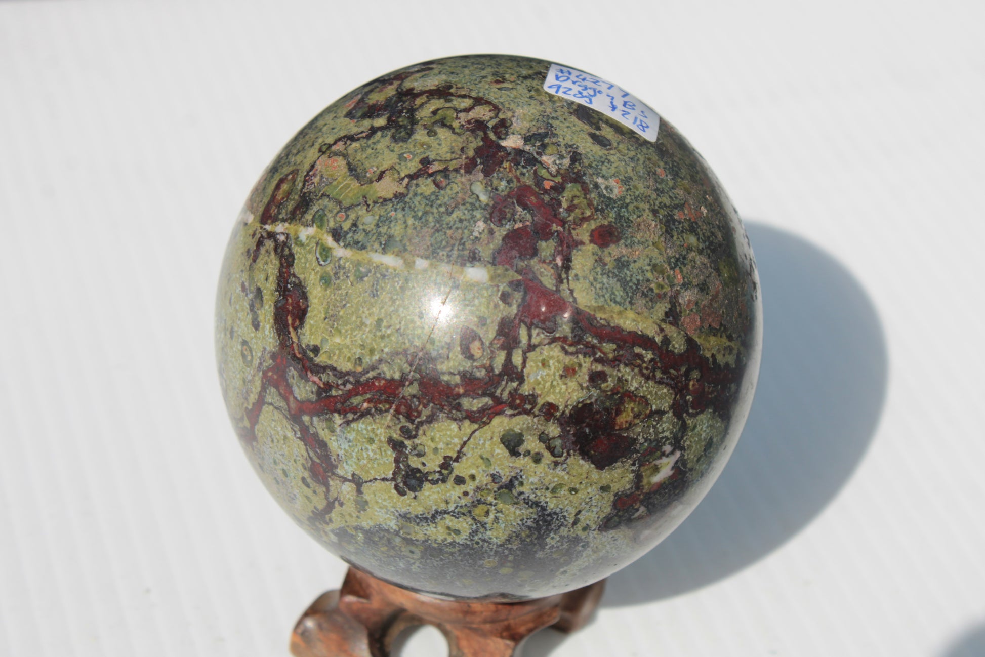 Dragons Blood Stone sphere 83mm 928g Rocks and Things