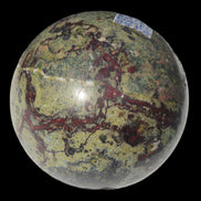 Dragons Blood Stone sphere 83mm 928g in sunlight - Rocks and Things Store
