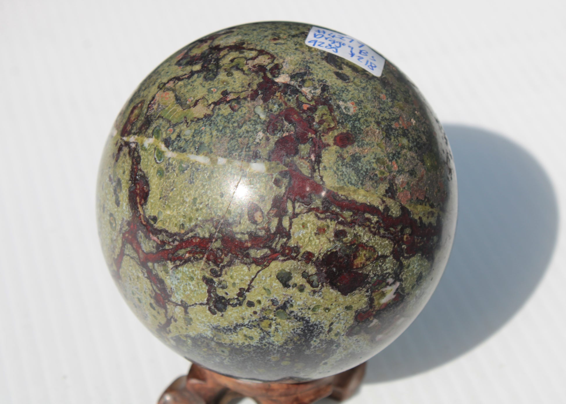 Dragons Blood Stone sphere 83mm 928g Rocks and Things