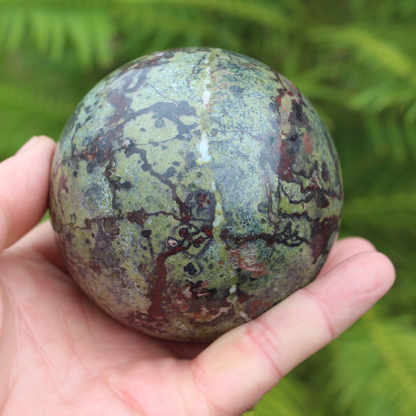 Dragons Blood Stone sphere 83mm 928g Rocks and Things