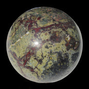 Dragons Blood Stone sphere 83mm 928g in sunlight - Rocks and Things Store