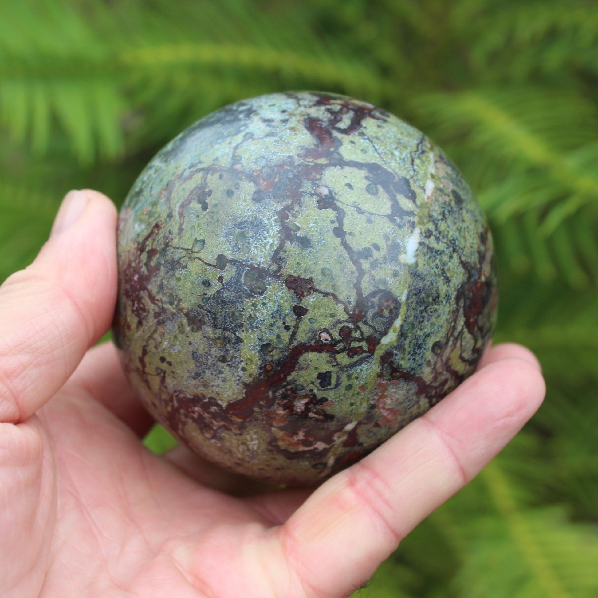 Dragons Blood Stone sphere 83mm 928g Rocks and Things