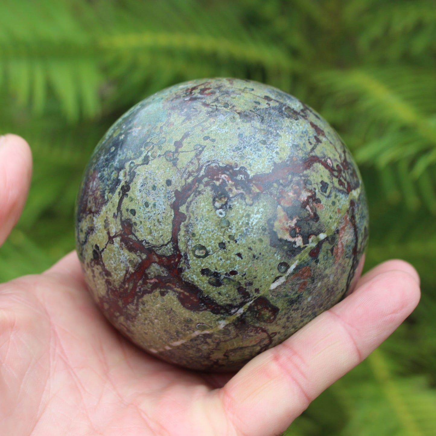 Dragons Blood Stone sphere 83mm 928g Rocks and Things