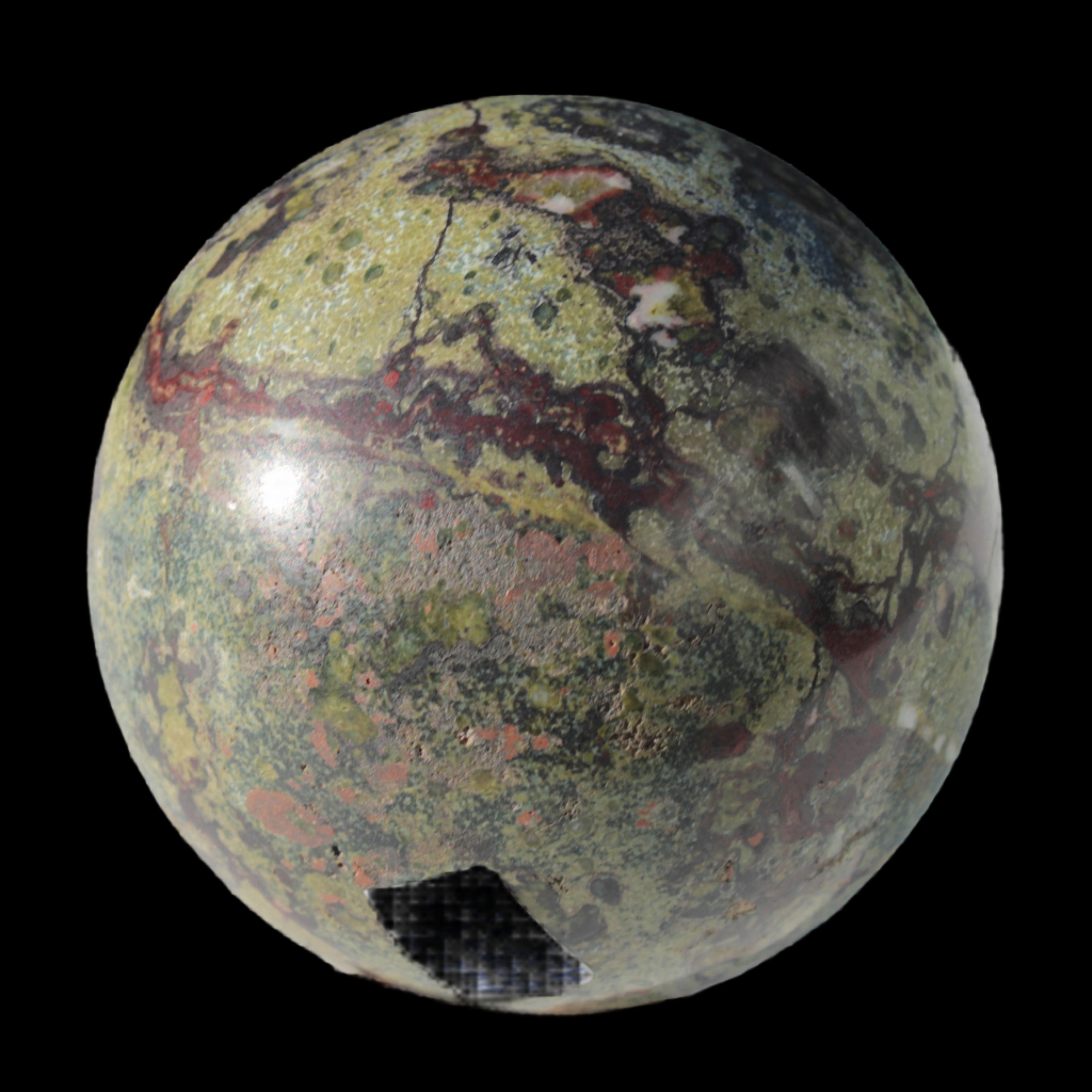 Dragons Blood Stone sphere 83mm 928g in sunlight - Rocks and Things Store