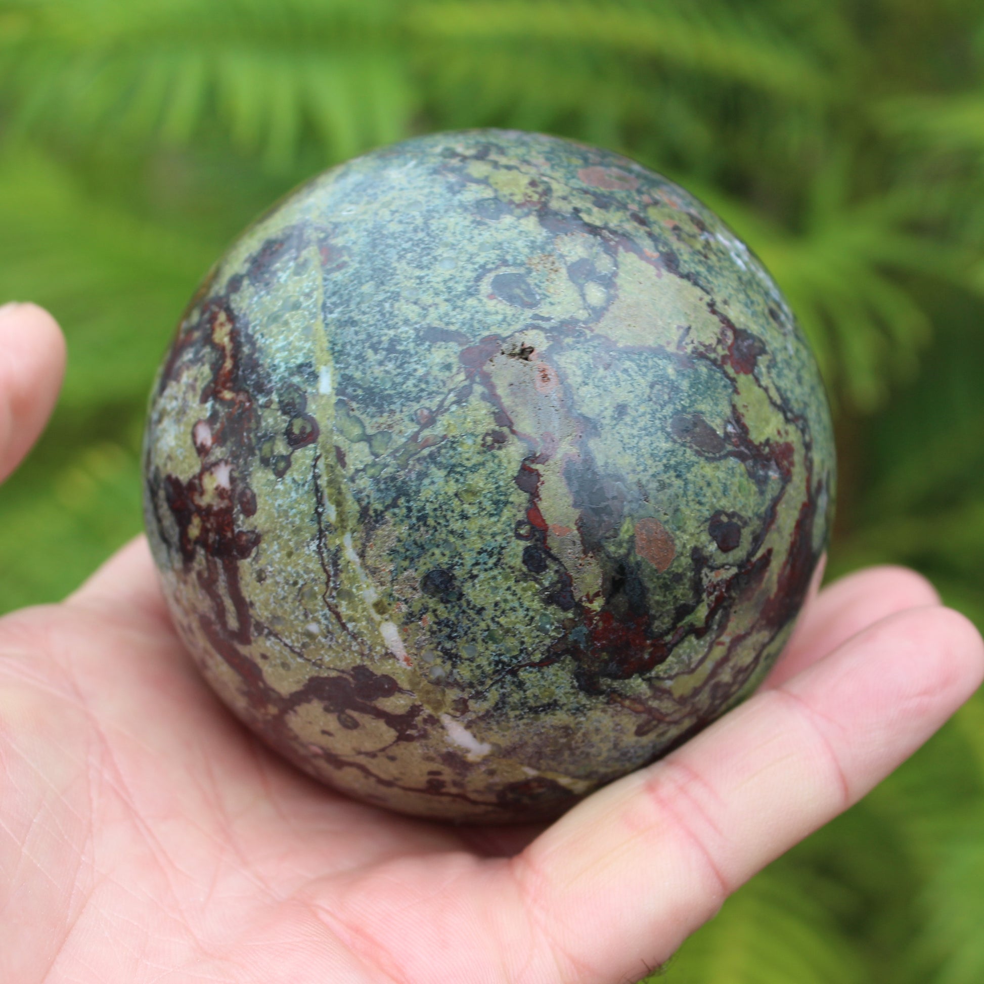 Dragons Blood Stone sphere 83mm 928g Rocks and Things