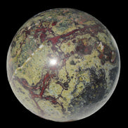 Dragons Blood Stone sphere 83mm 928g in sunlight - Rocks and Things Store