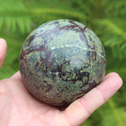 Dragons Blood Stone sphere 83mm 928g Rocks and Things