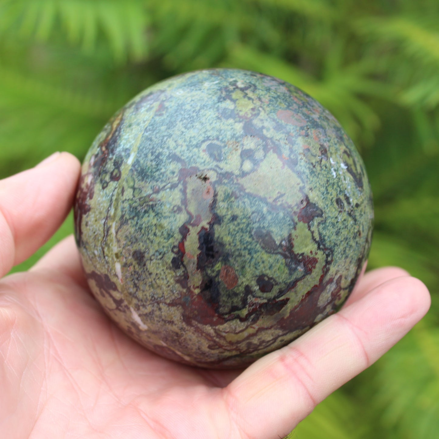 Dragons Blood Stone sphere 83mm 928g Rocks and Things