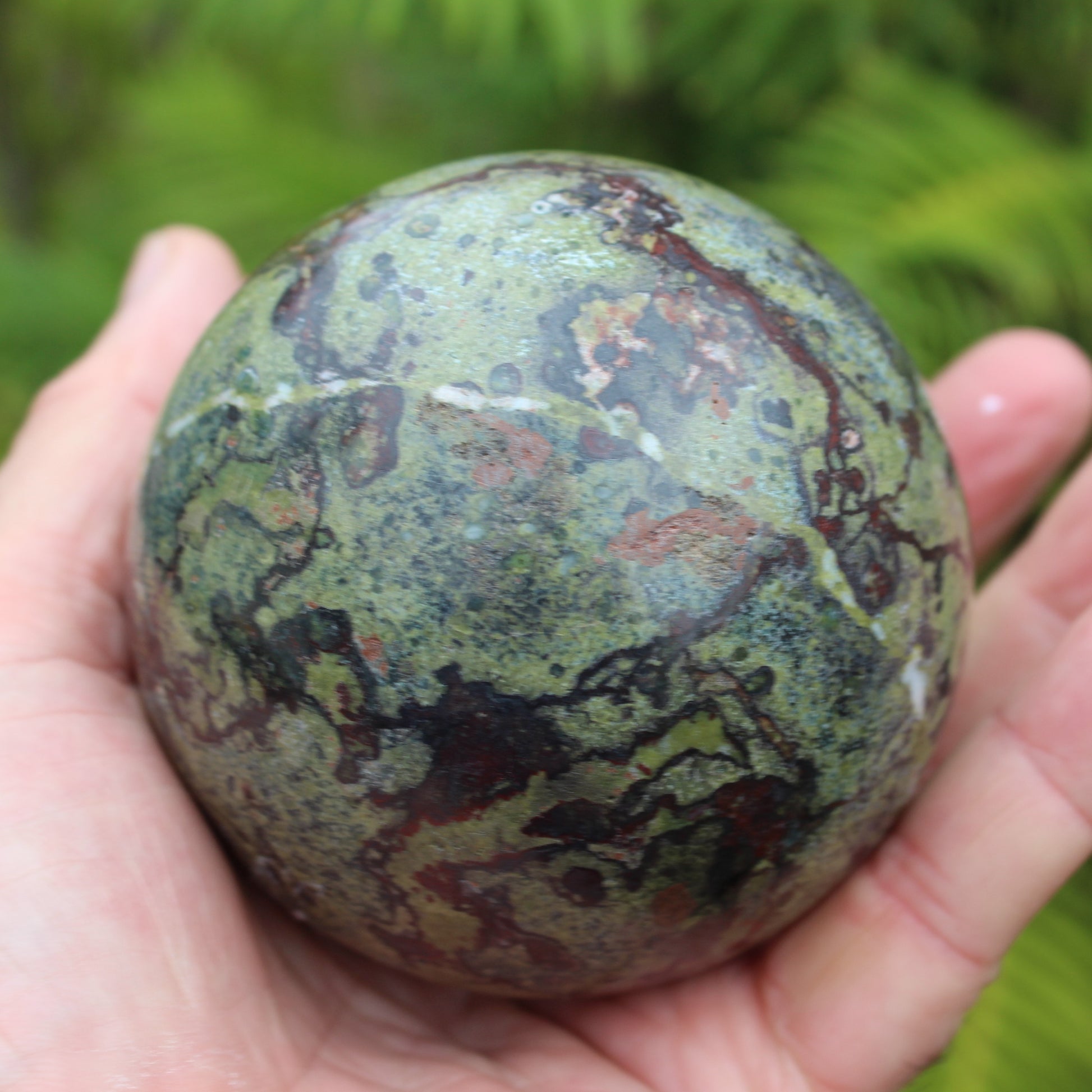 Dragons Blood Stone sphere 83mm 928g Rocks and Things