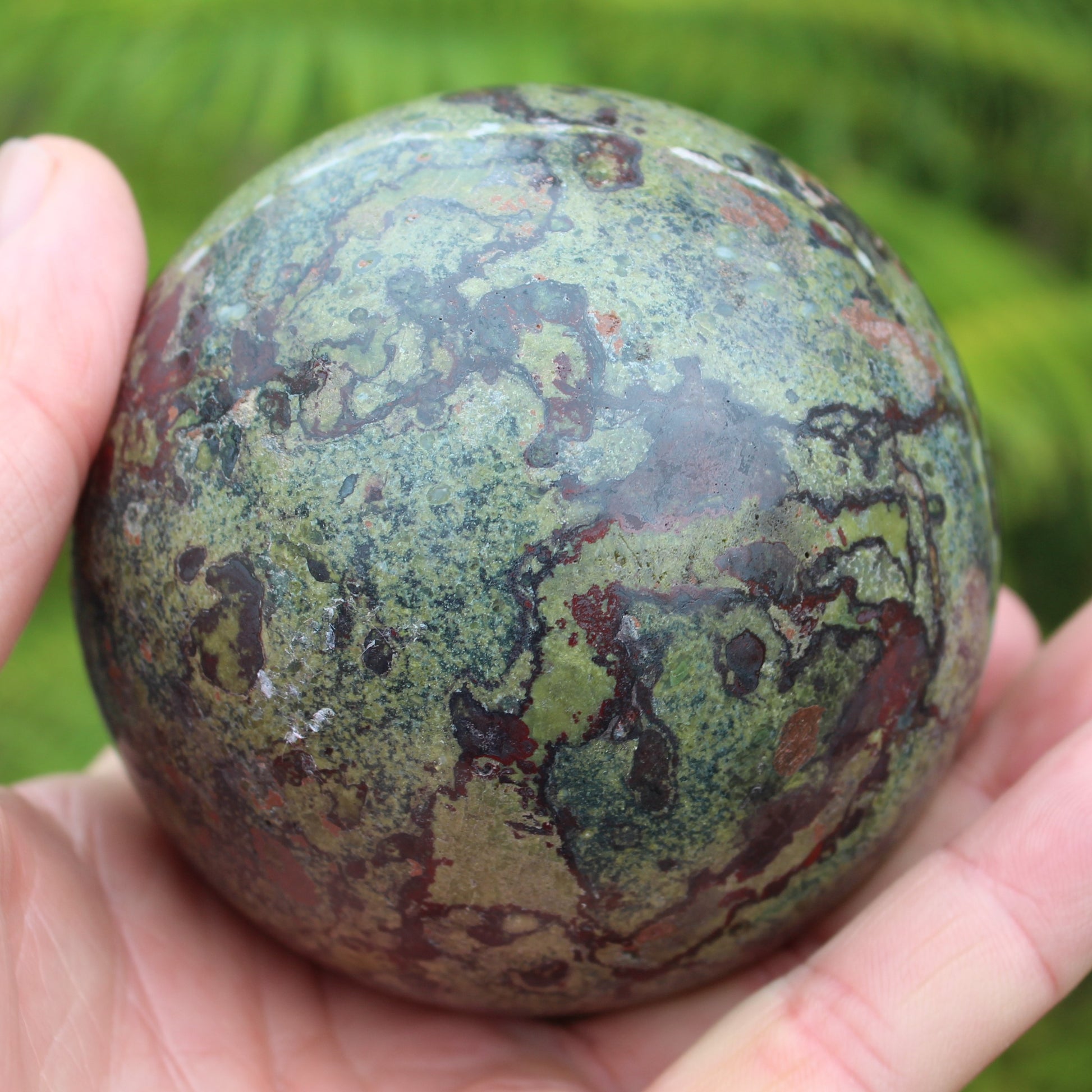 Dragons Blood Stone sphere 83mm 928g Rocks and Things