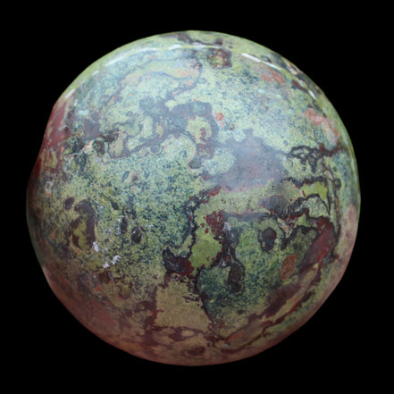 Dragons Blood Stone sphere 83mm 928g in sunlight - Rocks and Things Store