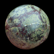 Dragons Blood Stone sphere 83mm 928g in sunlight - Rocks and Things Store