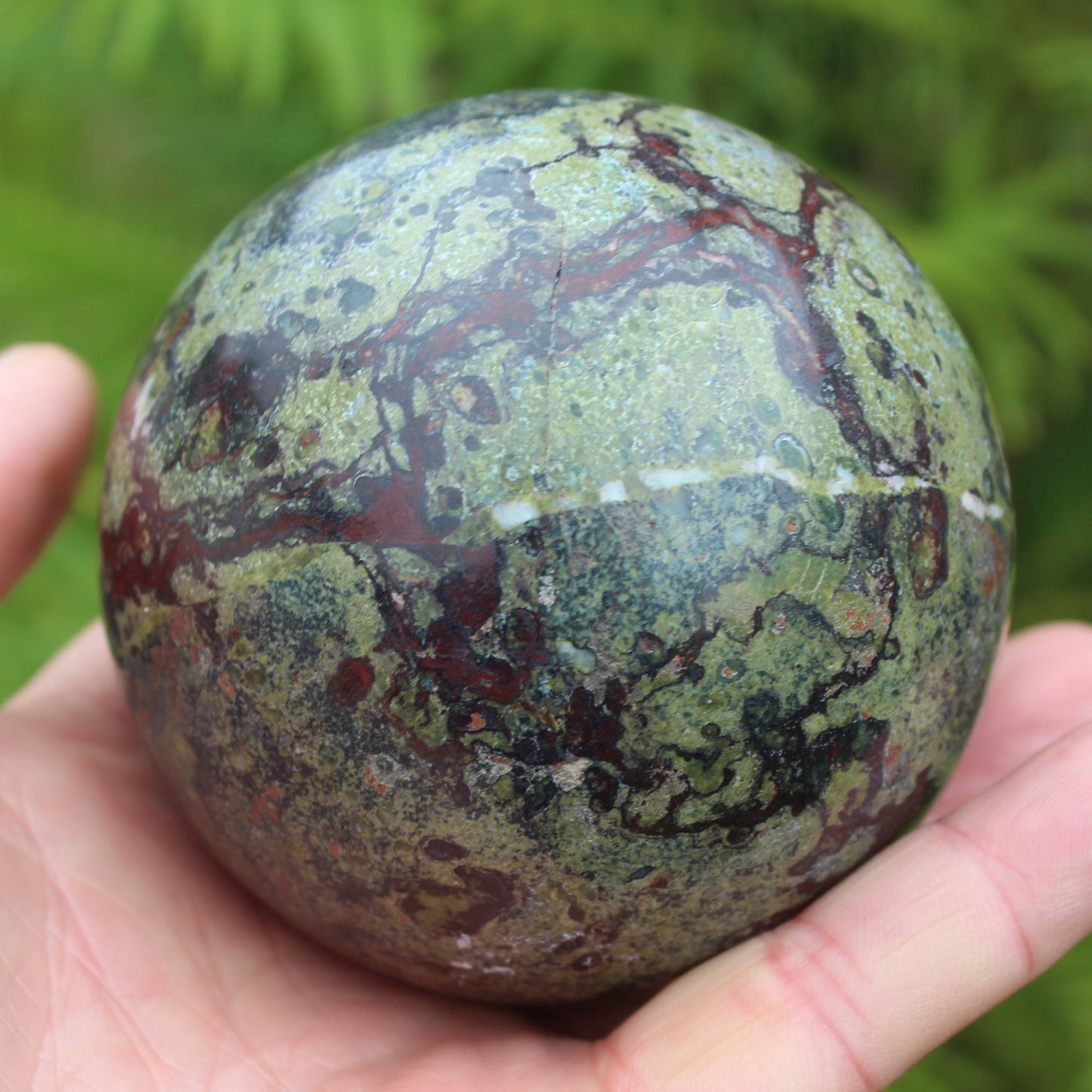 Dragons Blood Stone sphere 83mm 928g Rocks and Things