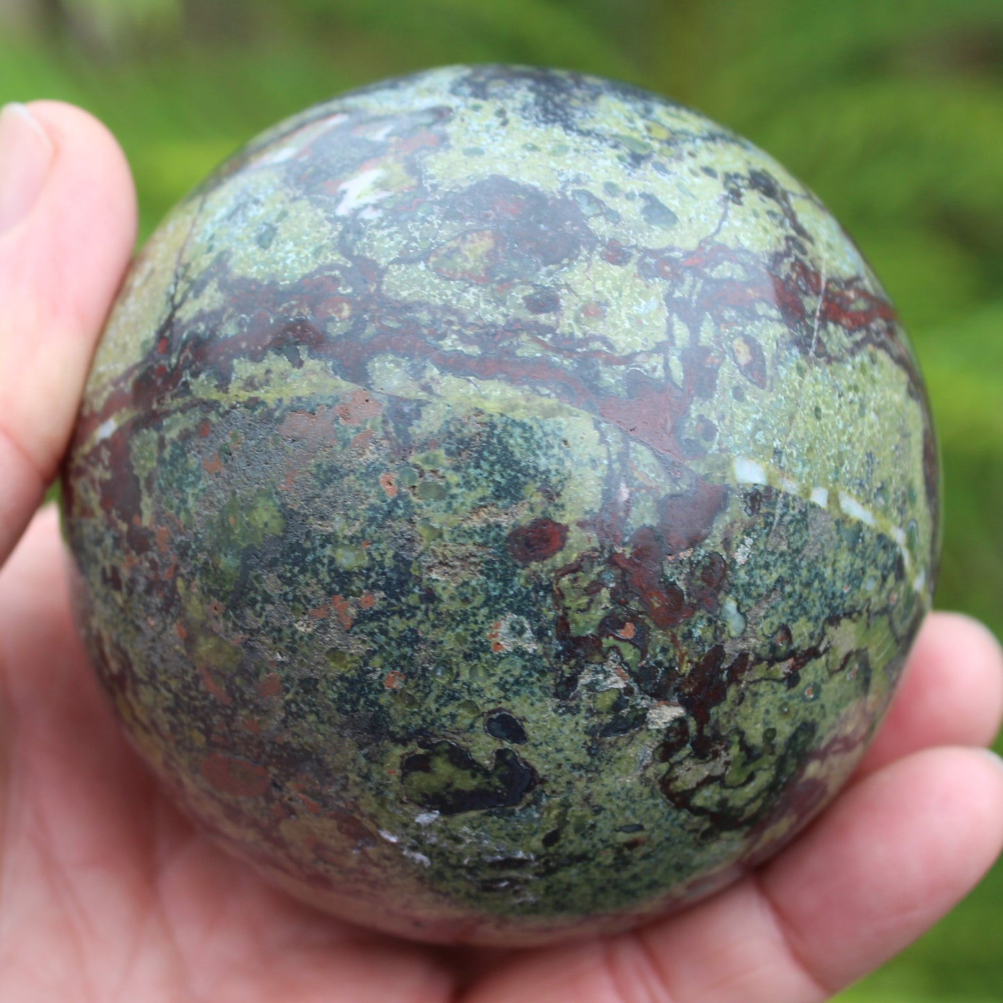 Dragons Blood Stone sphere 83mm 928g Rocks and Things