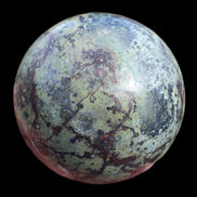 Dragons Blood Stone sphere 83mm 928g in sunlight - Rocks and Things Store