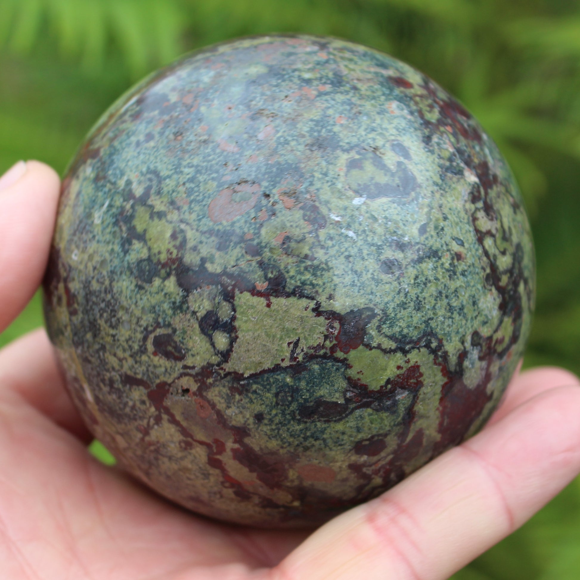 Dragons Blood Stone sphere 83mm 928g Rocks and Things