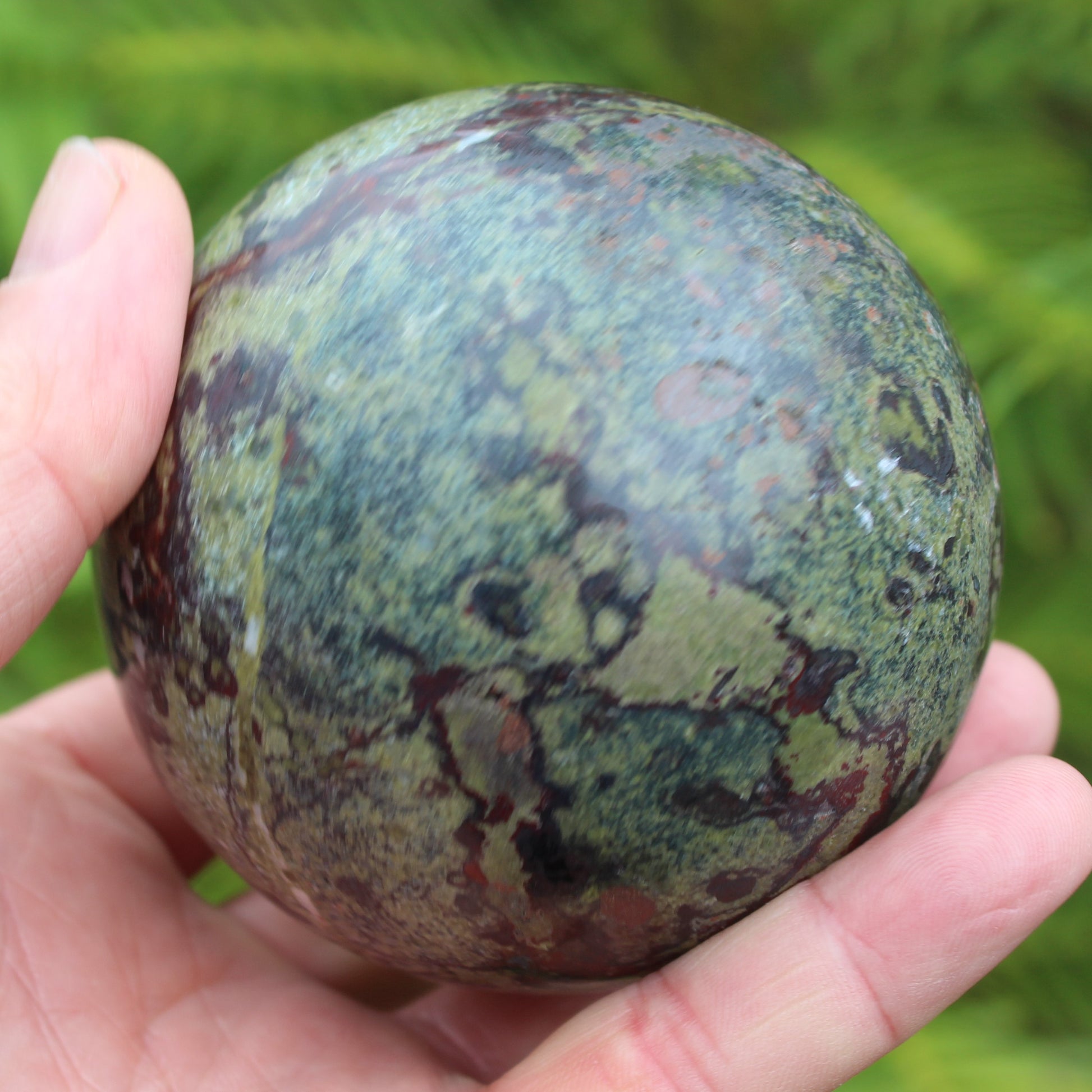 Dragons Blood Stone sphere 83mm 928g Rocks and Things