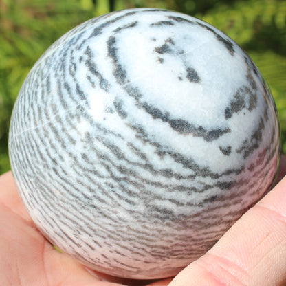 Zebra stone sphere 429g Rocks and Things