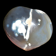 Killer Whale Agate heart 548g in sunlight - Rocks and Things Store